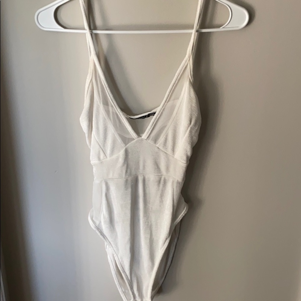 Cream body suit